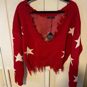 NWT red cropped sweater with star detail